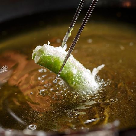 Hotel The Celestine Kyoto Gion Luaran gambar A spring roll being dipped in hot oil